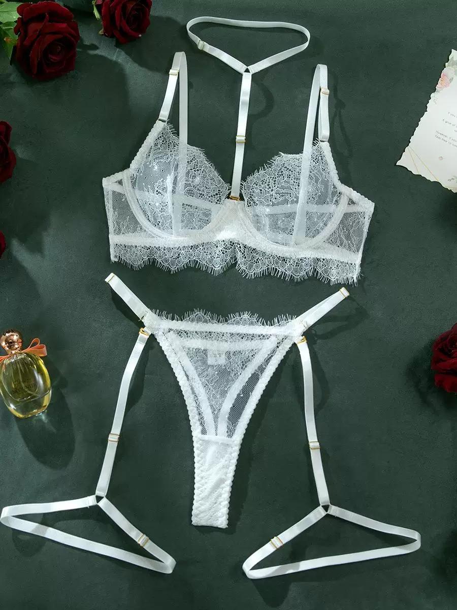Full back view of white 3-piece eyelash lace lingerie set showing strap configuration and garter bands