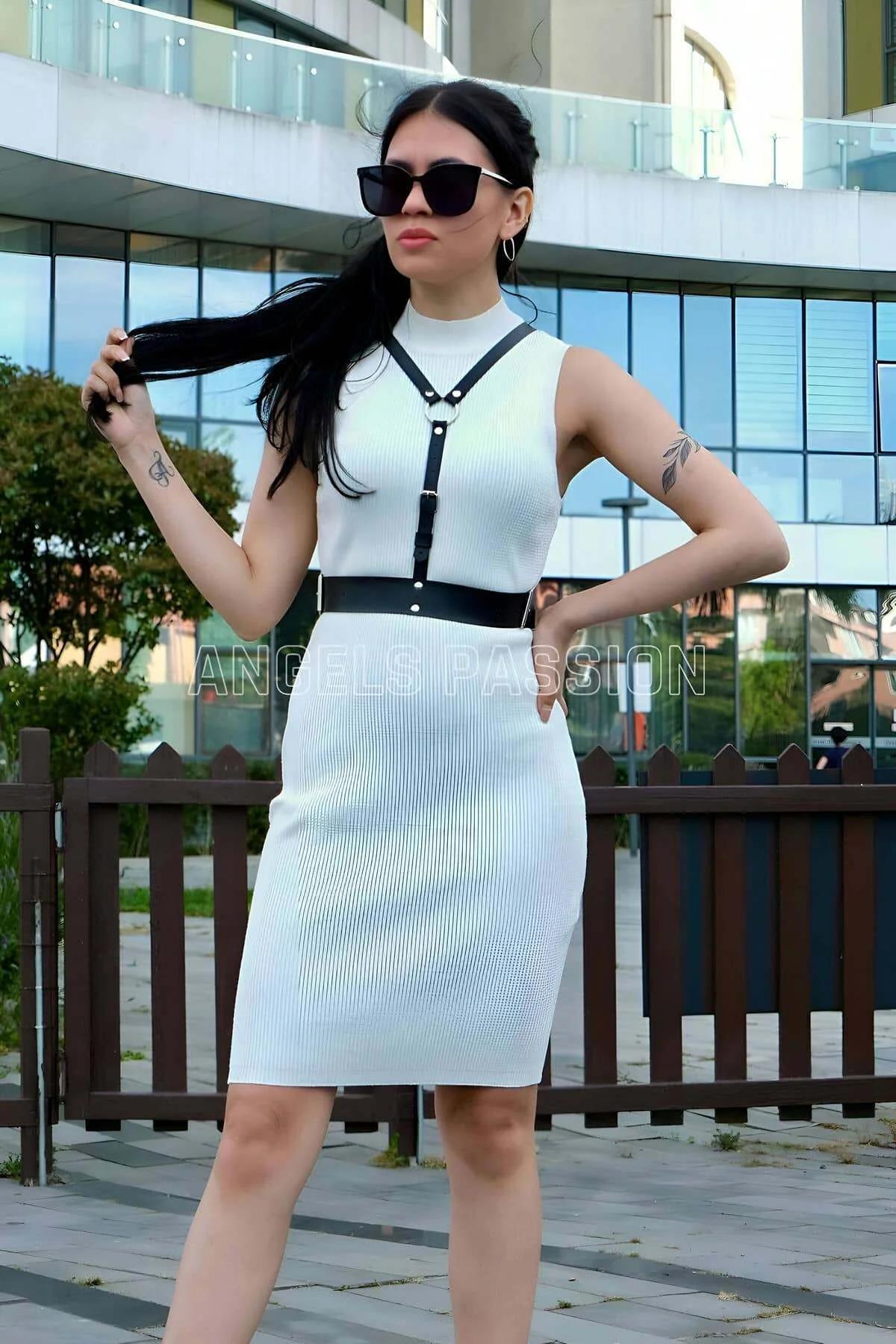Black PU leather waist band with silver snap closures detail view