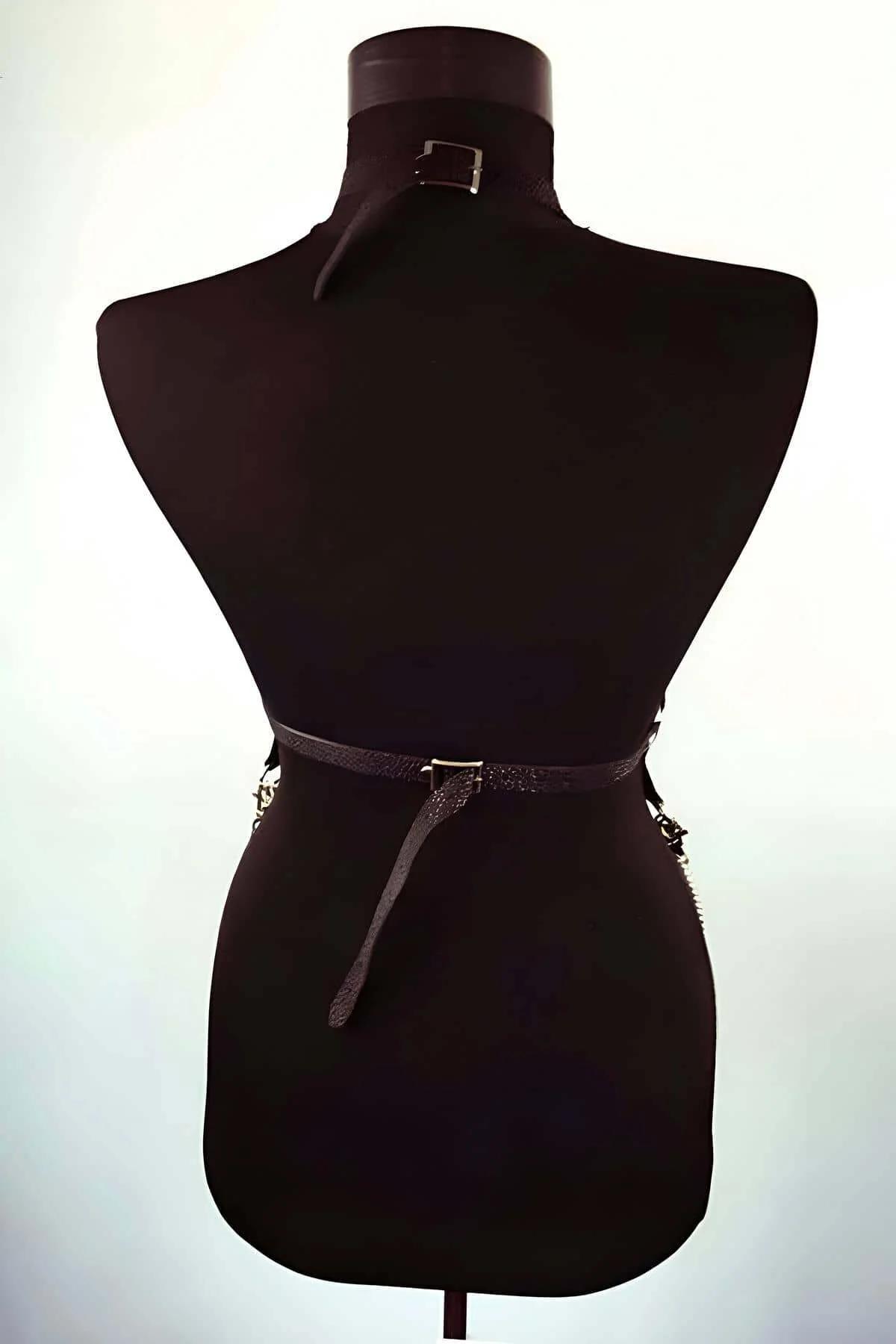 black PU leather chest strap harness showing dual silver O-rings and rivet studs at collarbone