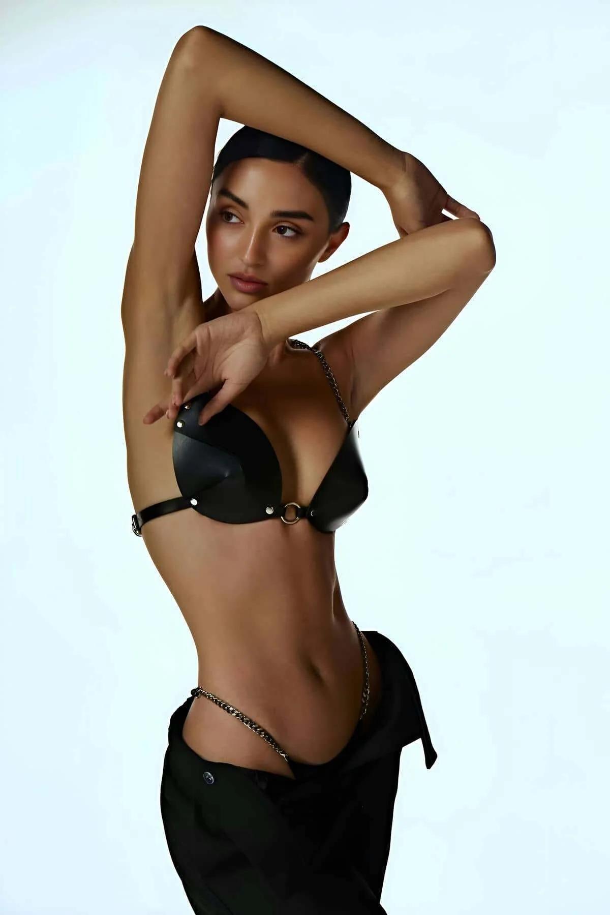 front view of black PU leather triangle bra cups with gold O-ring buckle underband closure