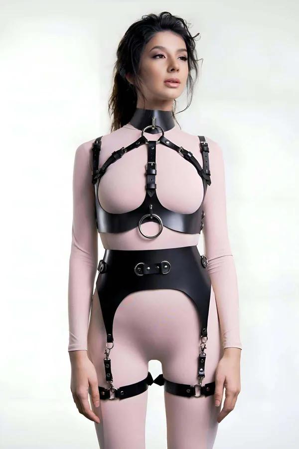 Black faux leather modular body harness set with silver O-rings, high collar, chest harness, waist cincher, and thigh garters