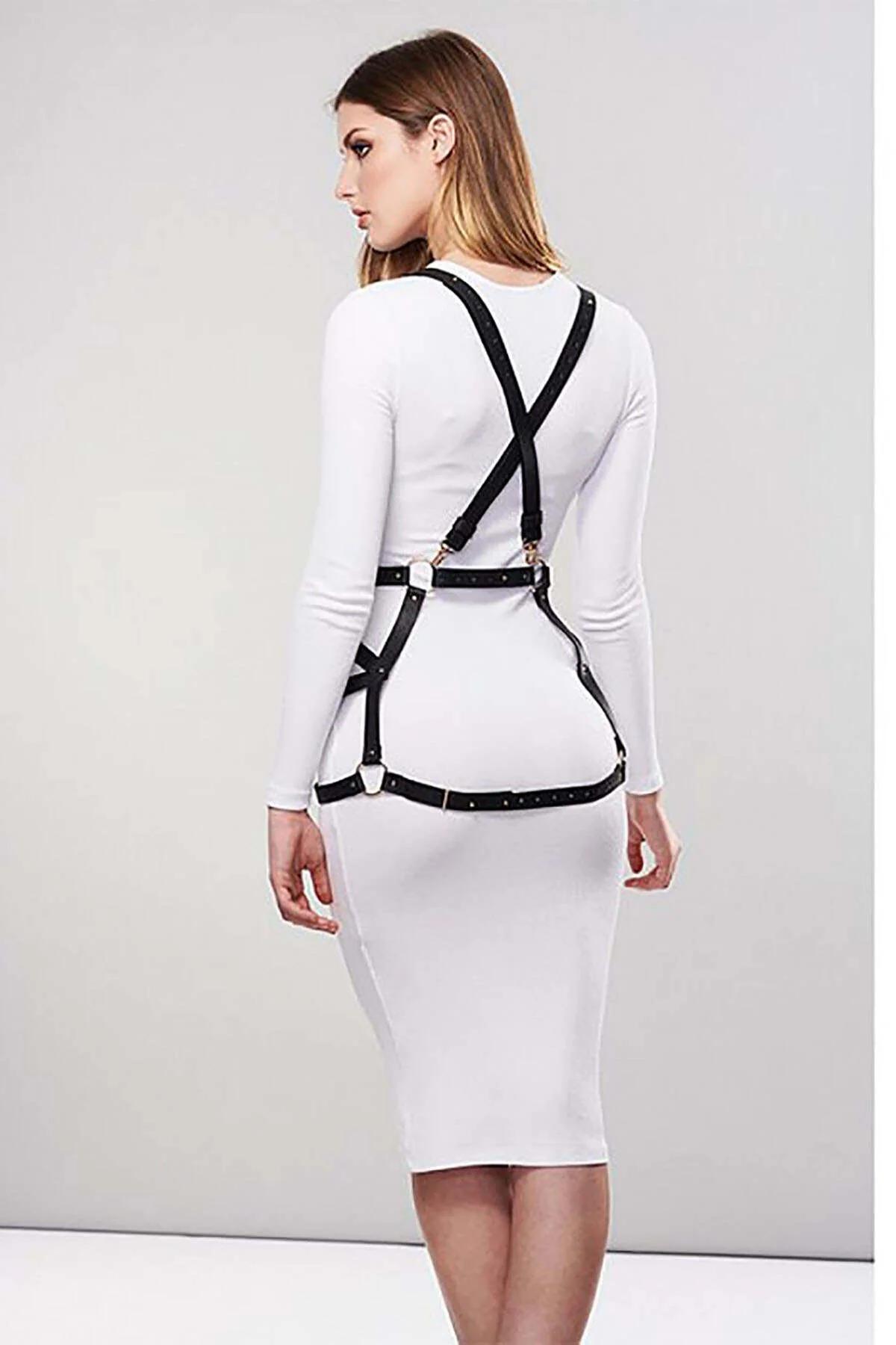 black faux leather shoulder-to-waist harness straps approximately 1.5 cm wide, flat lay
