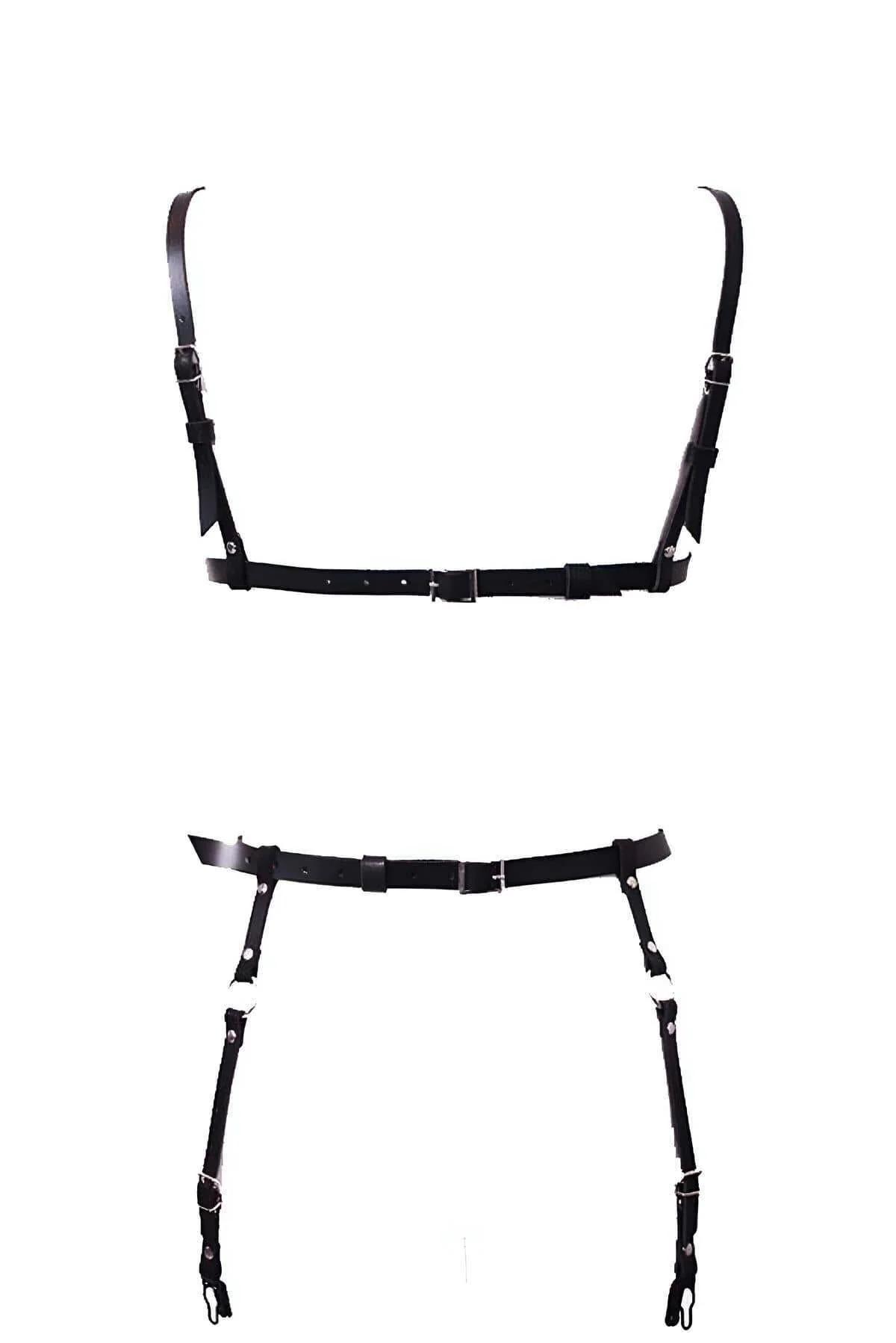 Black PU faux leather chest harness X-cross strap detail with central silver O-ring, front view