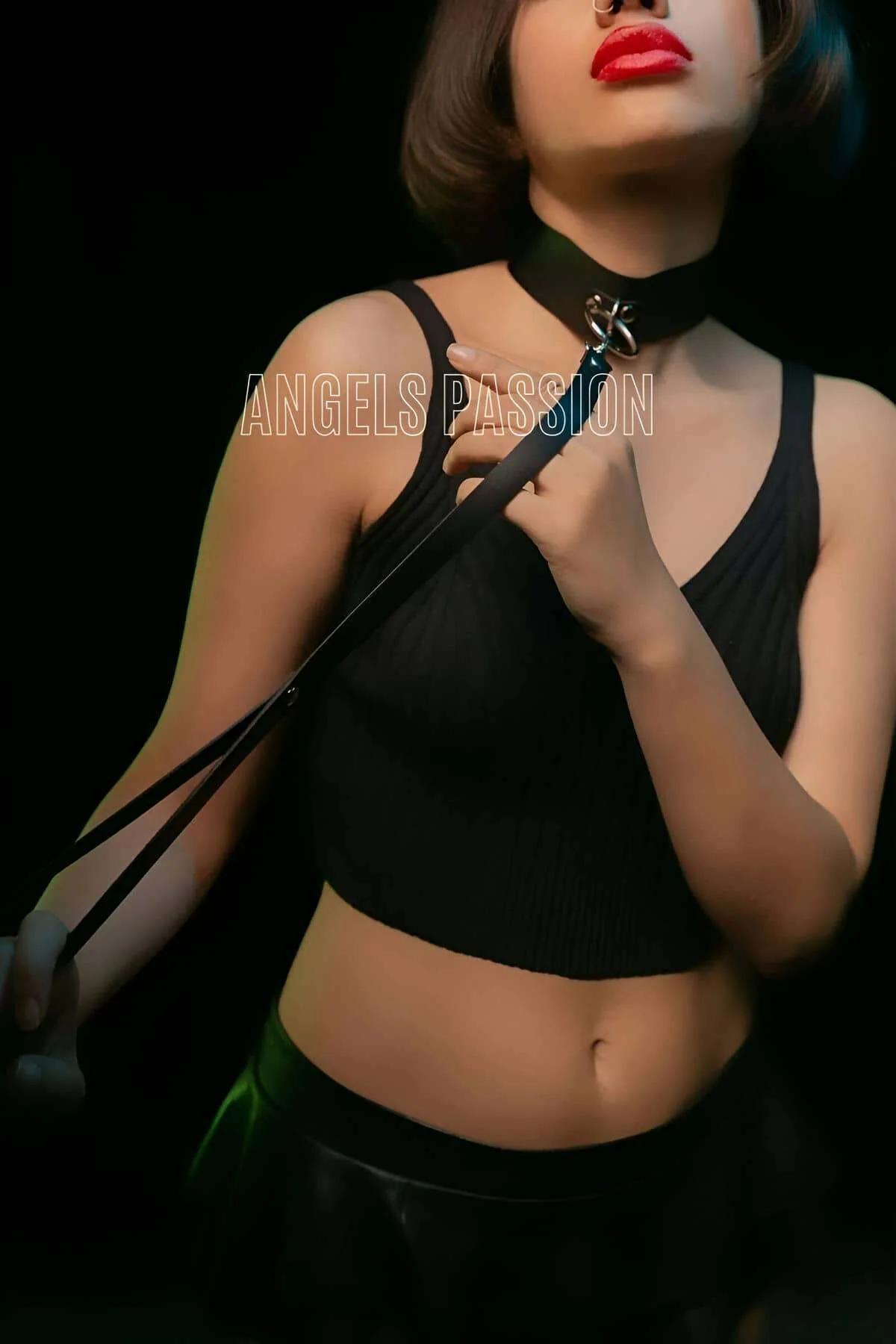 black choker collar with detachable leash unclipped showing lobster-claw clasp detail