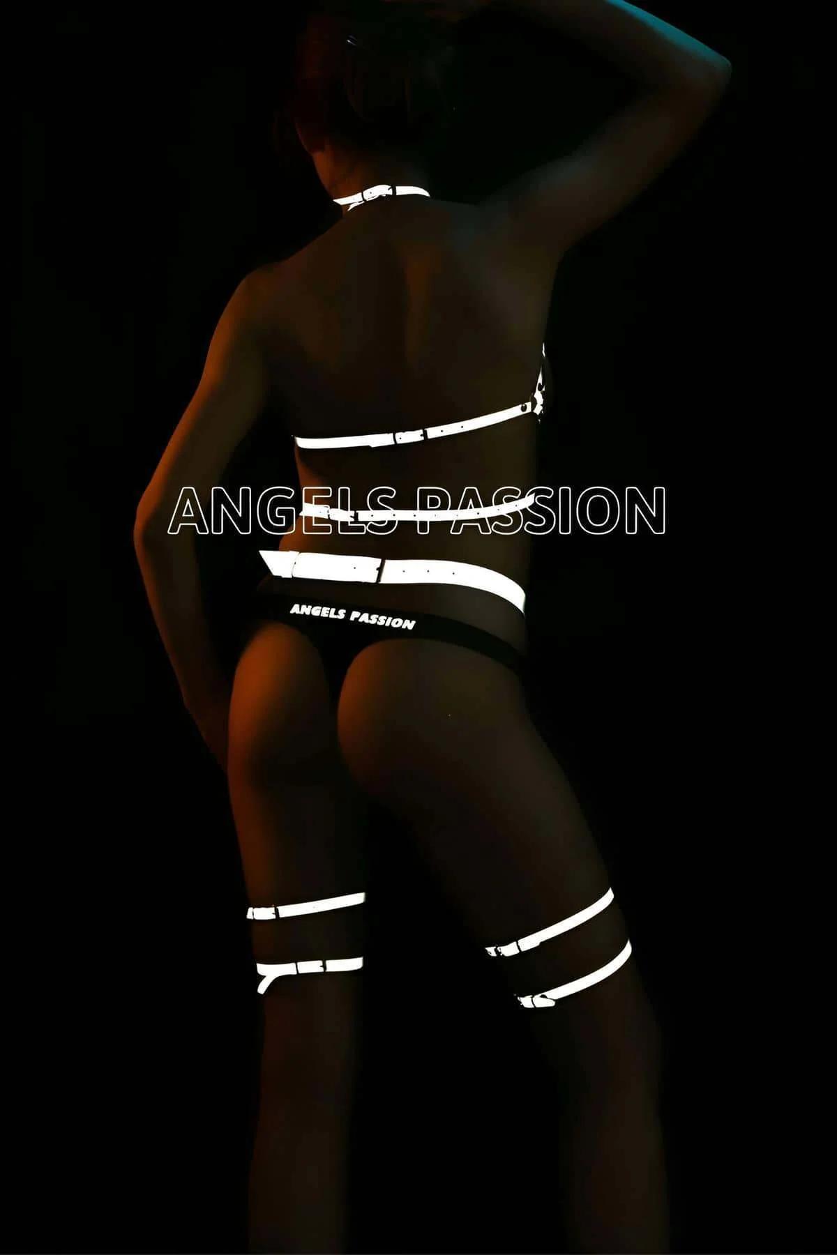 Waist belt detail of holographic reflective harness set showing silver-toned snap closures and adjustment points