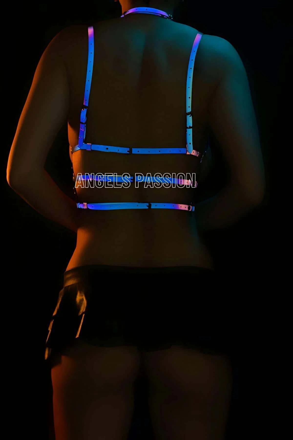 Geometric multi-strap reflective harness waist band and central O-ring close-up