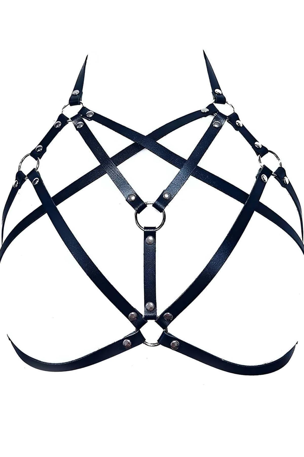 Close-up of silver O-ring anchors at strap crossings on black faux leather star chest harness