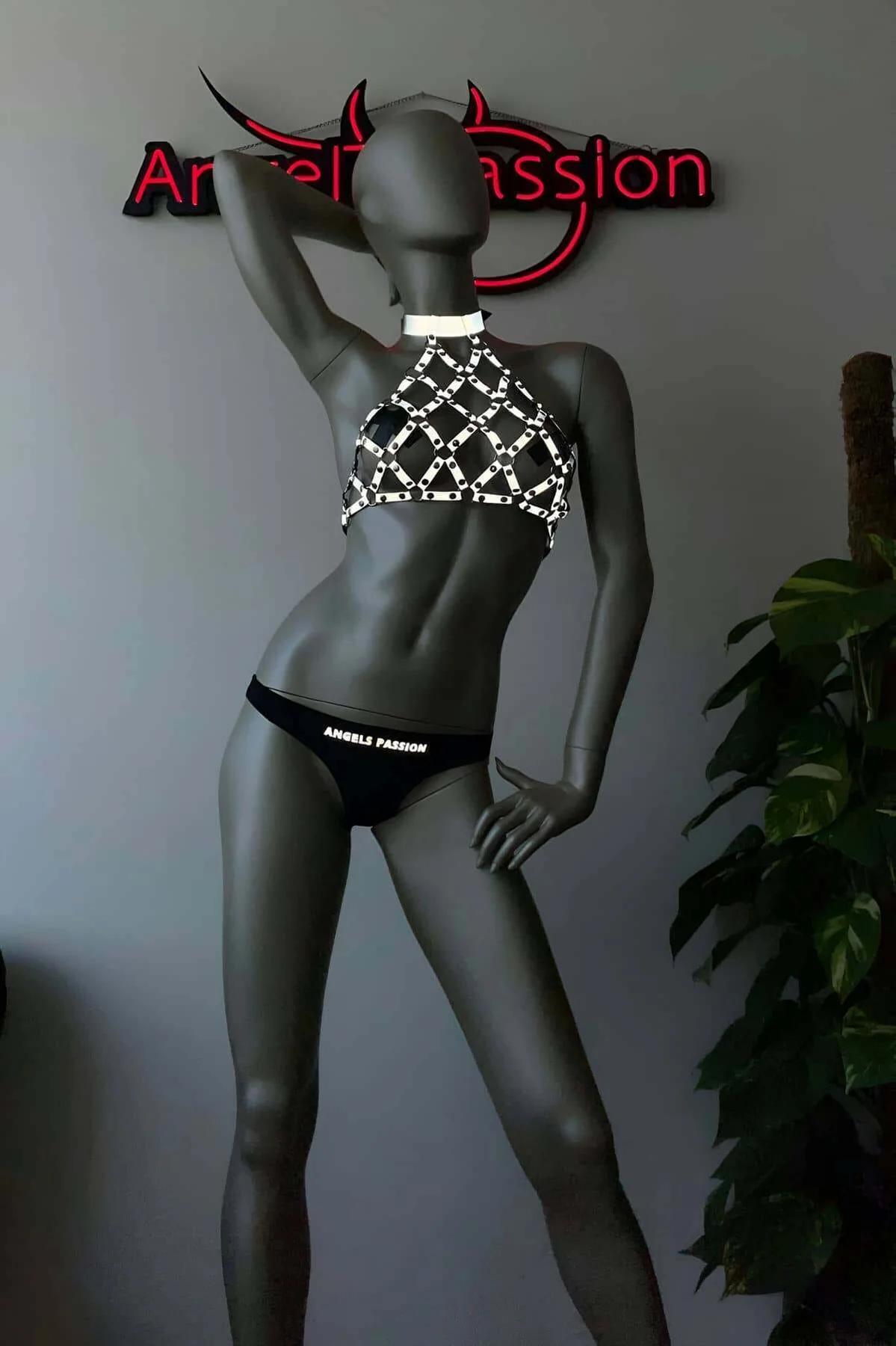 Silver halter neck band closure detail on chainmail harness approximately 3 cm wide