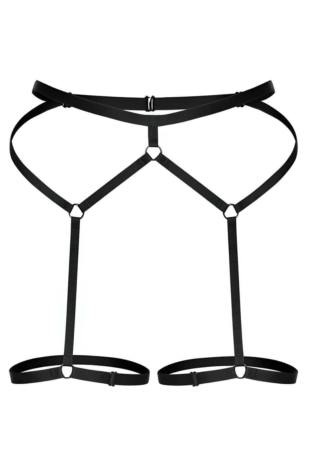 Matte black elastic body harness showing diamond cross-strap hip panel with two gold-tone connector rings