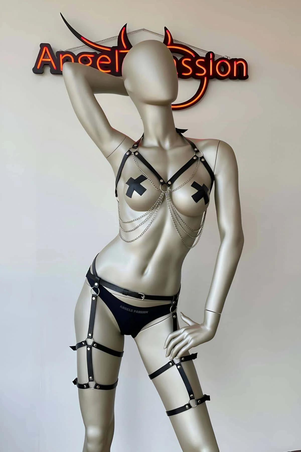 Faux leather waist belt with rectangular buckle and O-ring hip connections on black harness set
