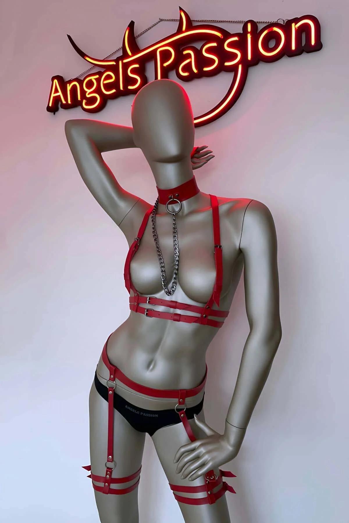 Red vegan leather full body harness set with silver chain choker, chest cage, waist belt, and double-strap thigh garters on m