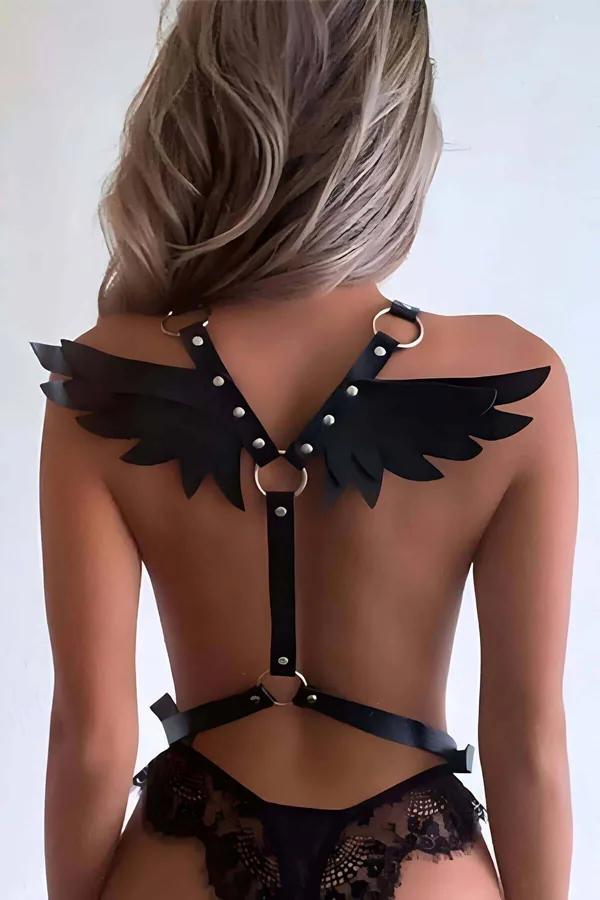 Black faux leather angel wing body harness back view with gold O-rings and silver rivet studs