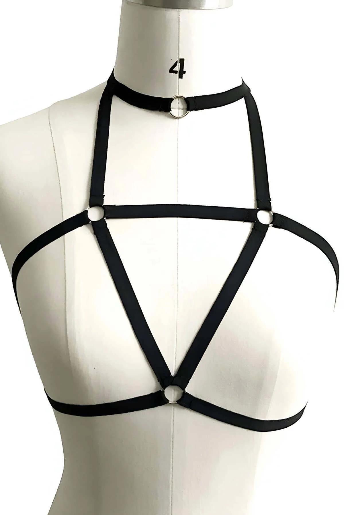 black matte elastic harness triangular strap layout framing chest from front view