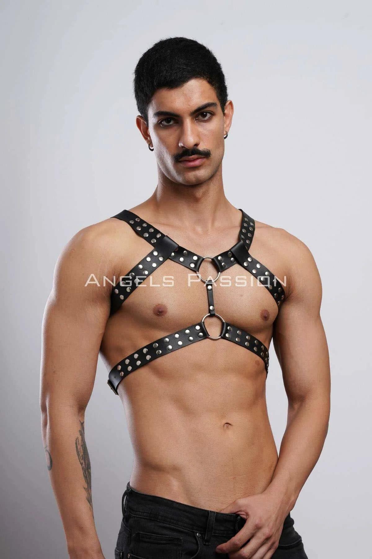 Studded faux leather harness worn over bare torso showing dual horizontal bands and waist O-ring
