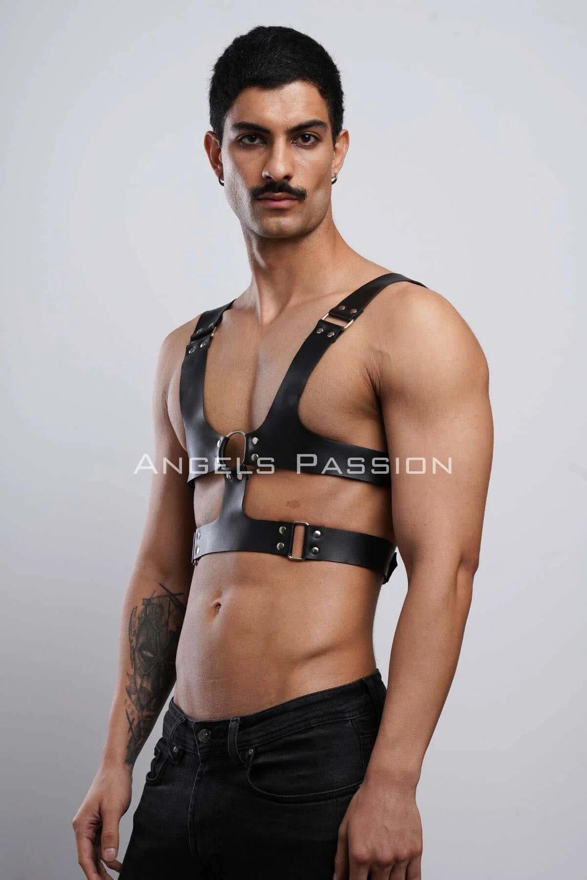 Black faux leather mens harness laid flat showing full strap layout and bronze buckle hardware