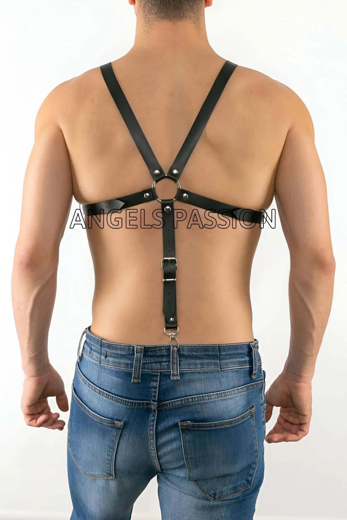 rear view of black adjustable body harness showing shoulder strap and back panel width
