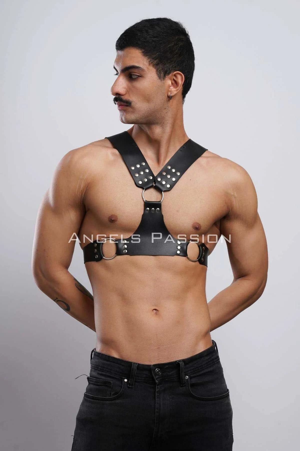 close-up of silver dome studs on black PU faux leather shoulder strap intersection
