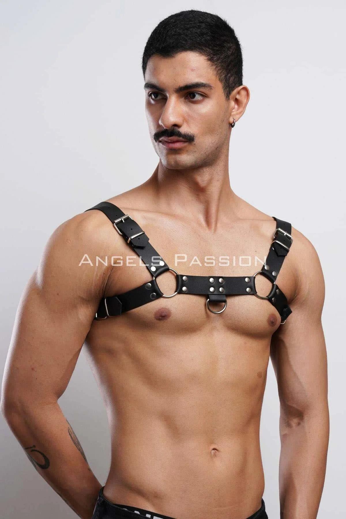 Lower D-ring detail on black PU leather chest harness front view