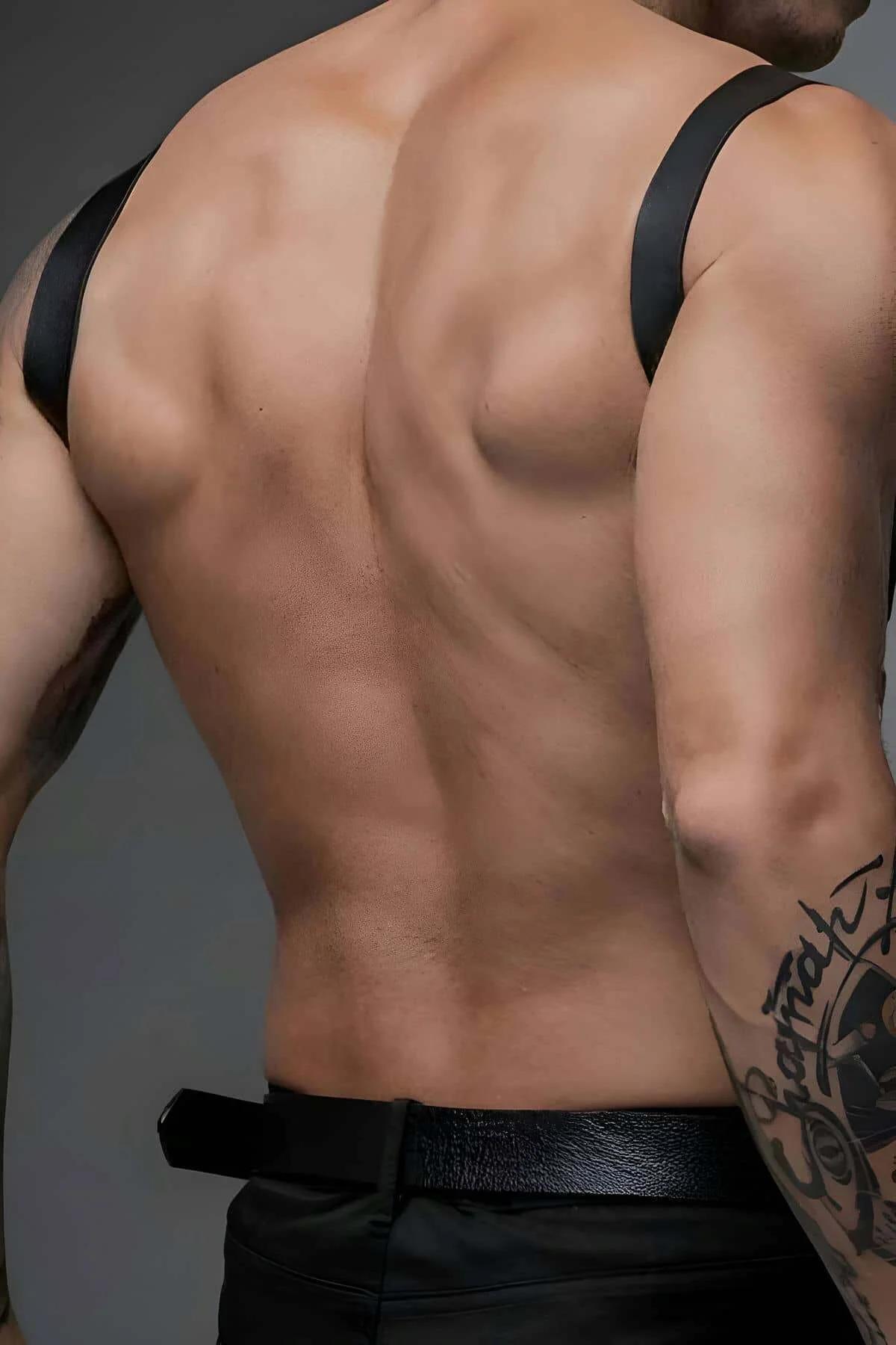 adjustable black PU chest harness silver buckle diagonal strap front view