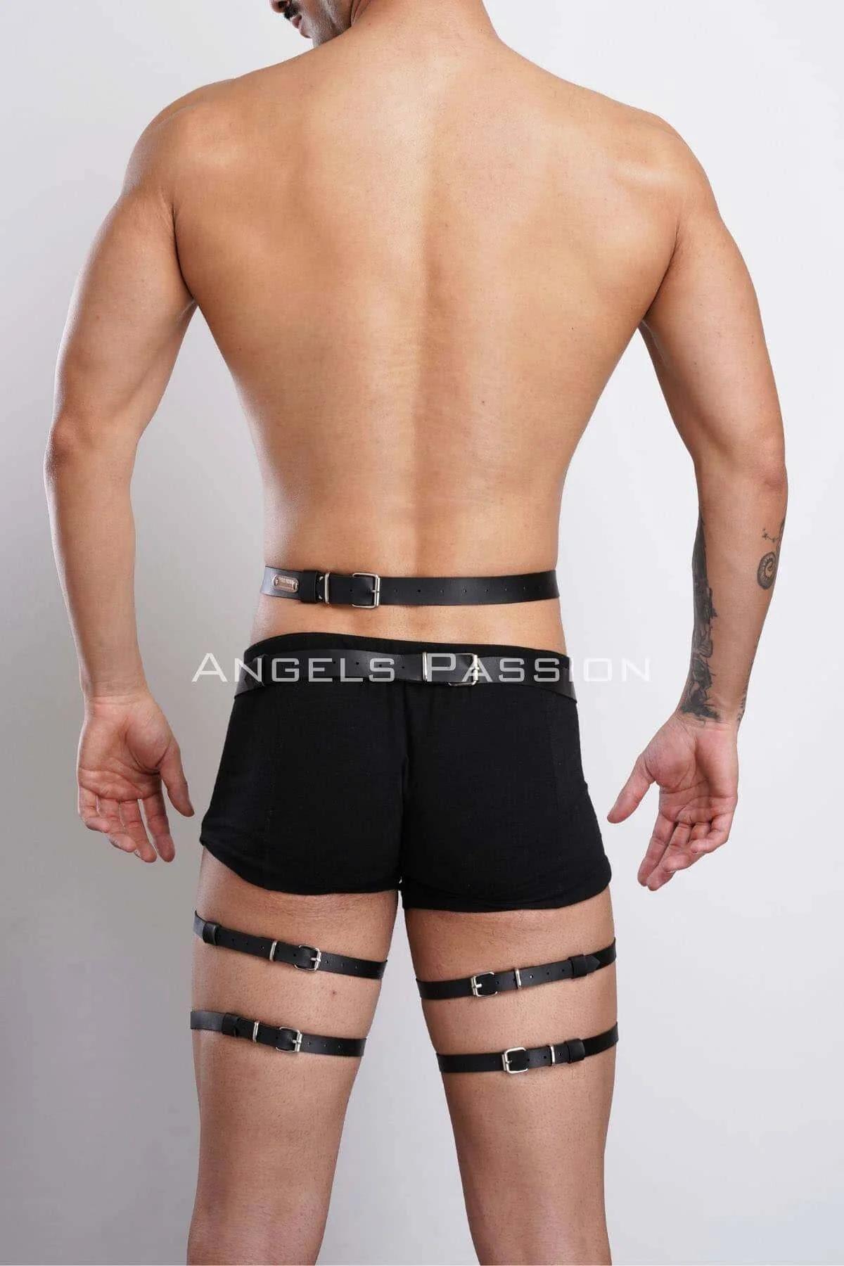 Black faux leather double thigh band harness laid flat showing full strap and O-ring layout