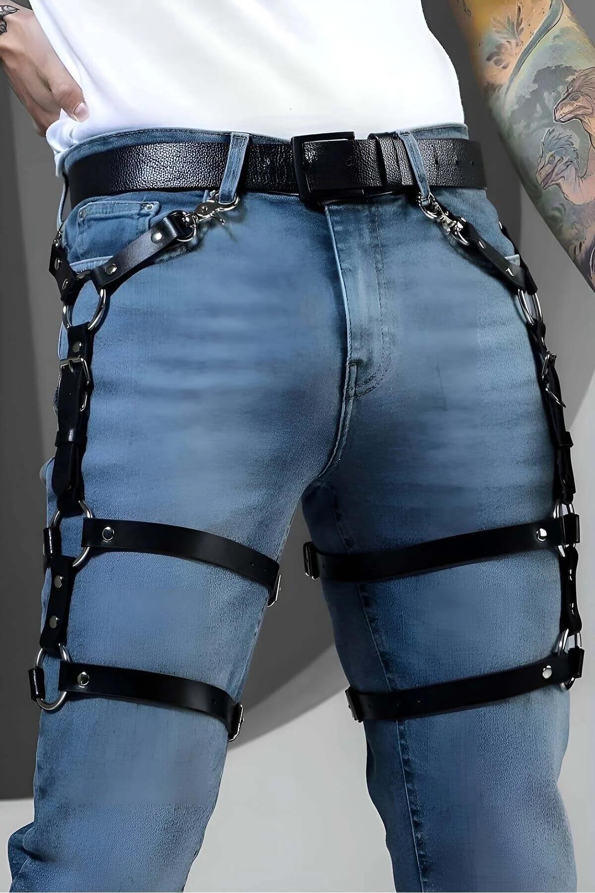 close-up of silver O-ring and rivet detail on black PU faux leather leg harness strap