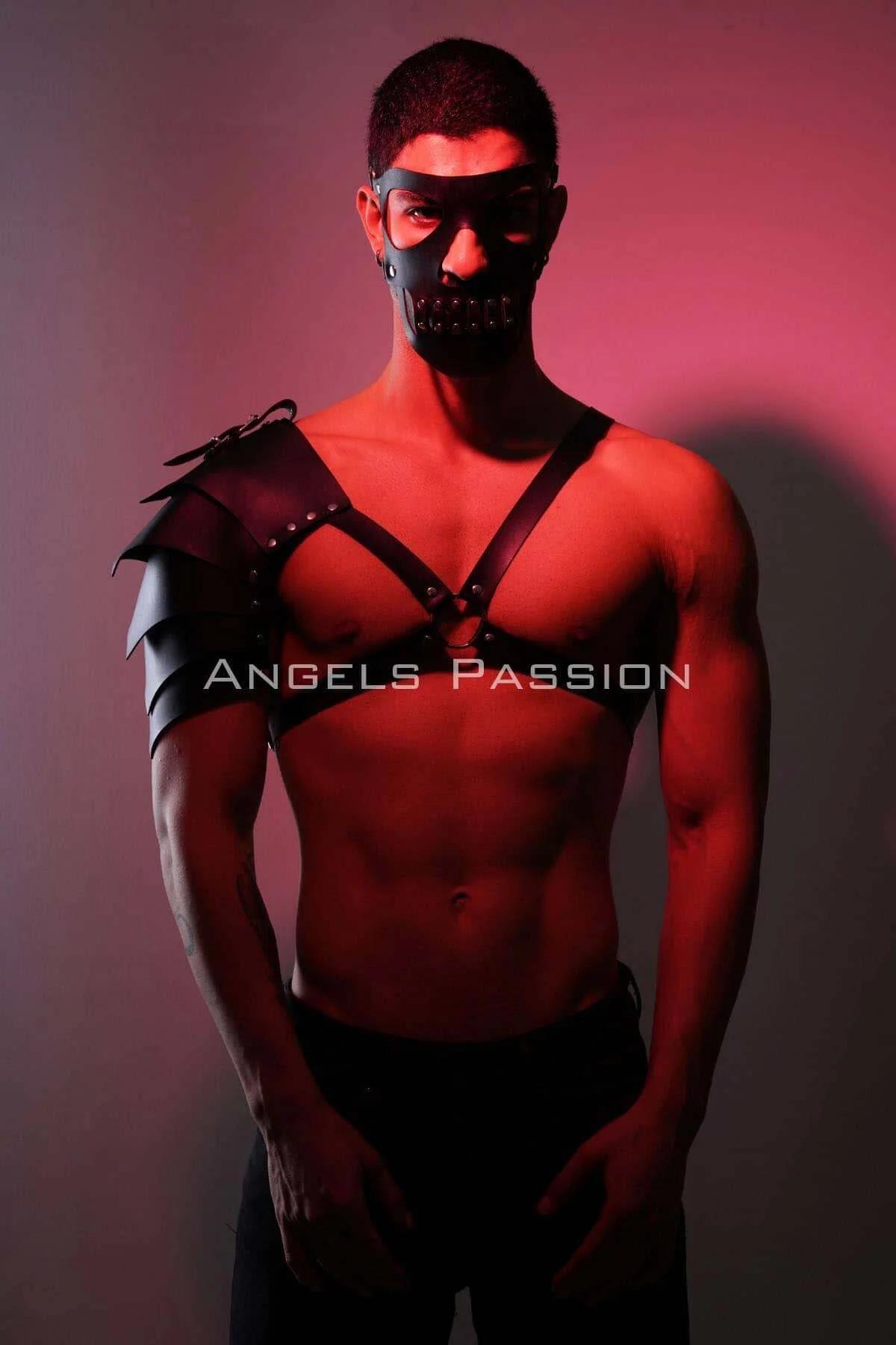 adjustable buckle detail on black faux leather chest strap and pauldron rivet construction close-up