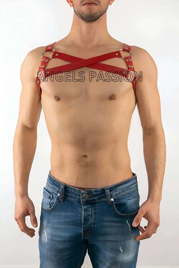 Red faux leather chest harness with X-strap criss-cross design and silver O-rings worn by male model