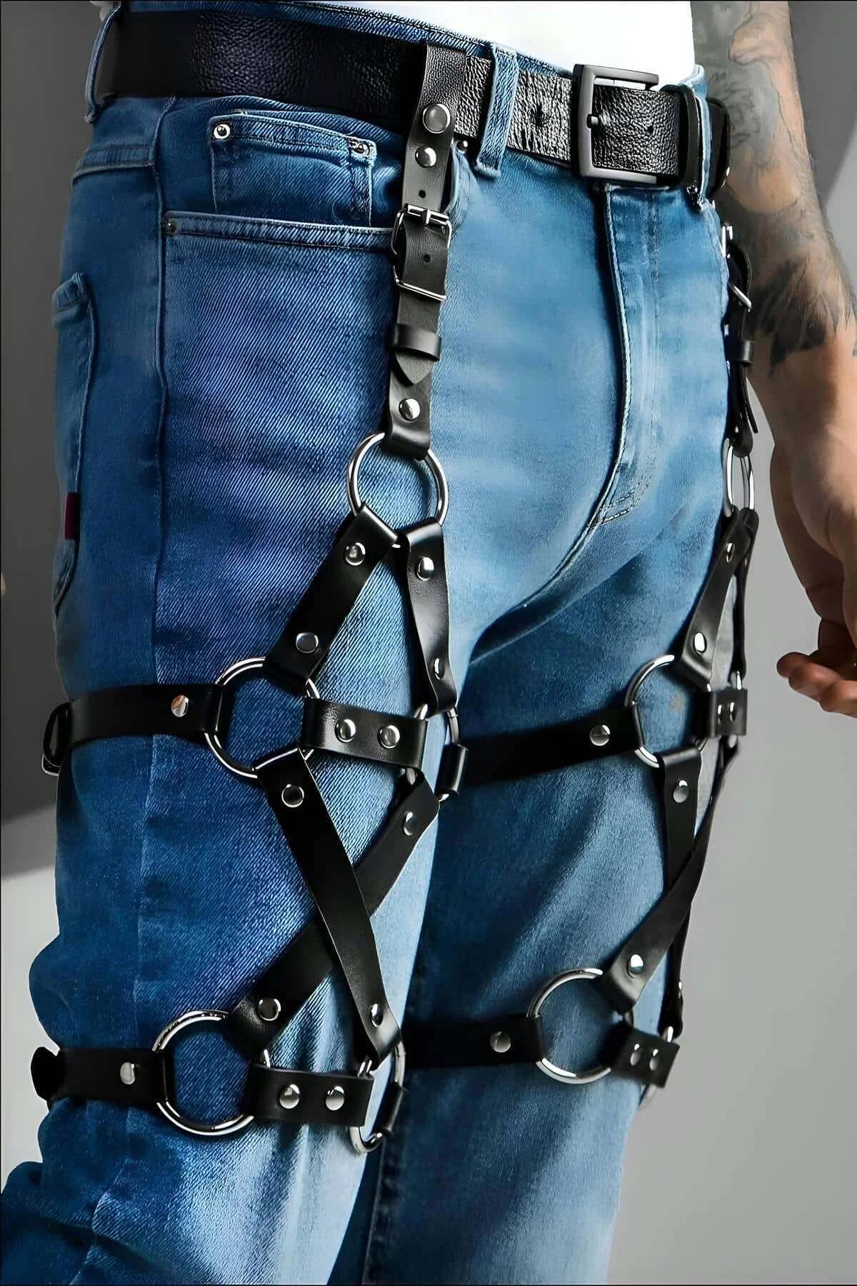 close-up of silver O-ring rivet detail on black PU faux leather thigh harness strap
