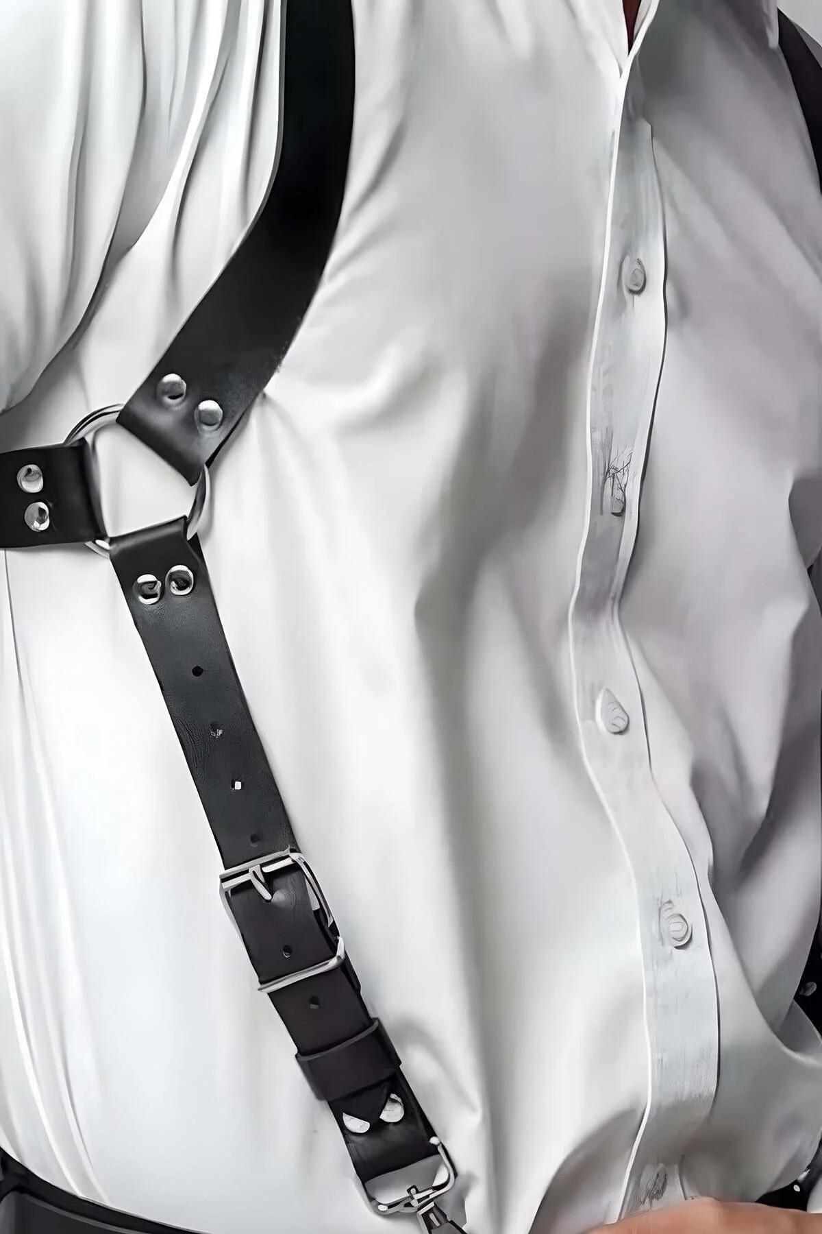Black PU shoulder harness X-back strap configuration with silver rectangular center buckle detail
