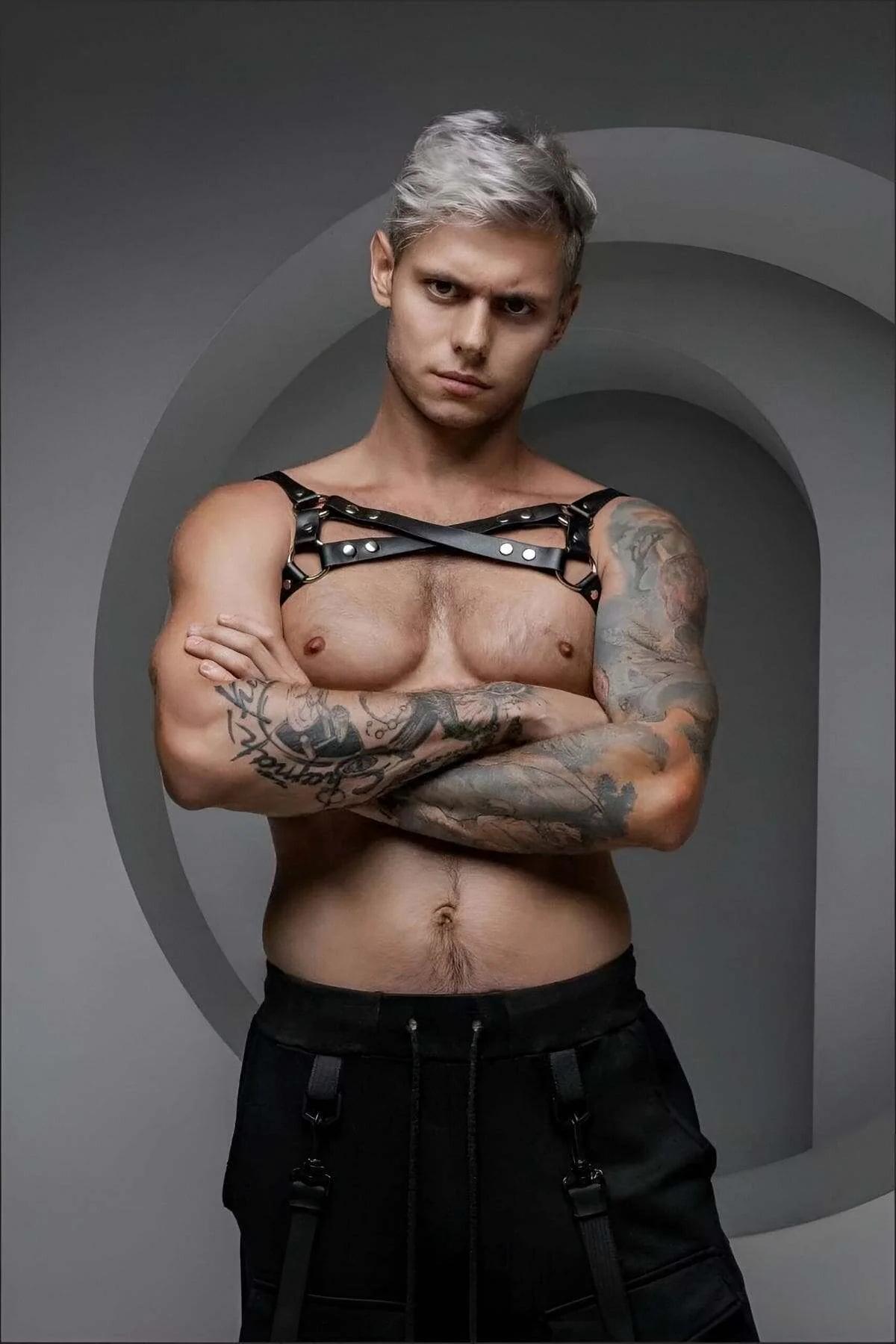 black PU chest harness crossed strap front view showing adjustable buckle closures