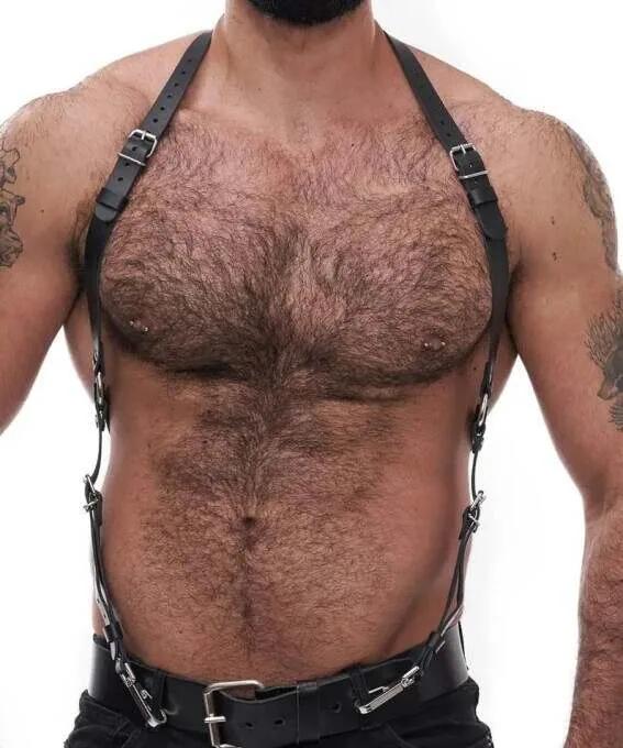 black faux leather chest harness with silver-tone multi-buckle straps and wide waistband on male torso