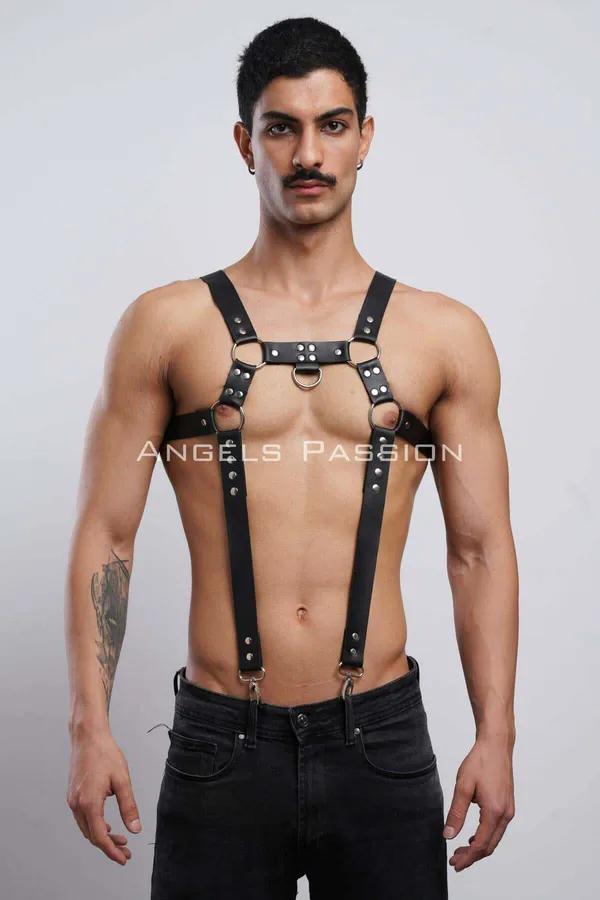 black faux leather mens chest harness with five silver o-rings and rivet accents worn over bare chest