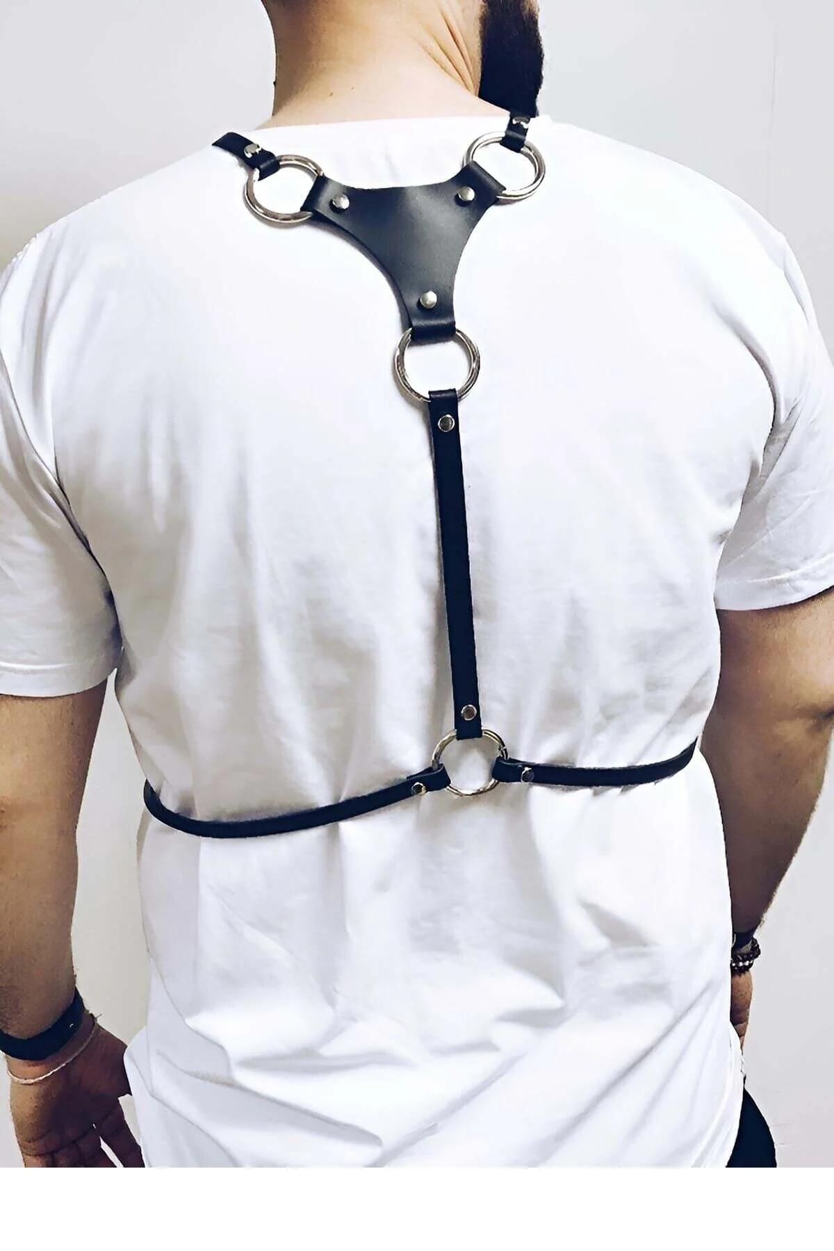 close-up of silver dome studs on black PU leather triangle panel with three O-ring hardware connections