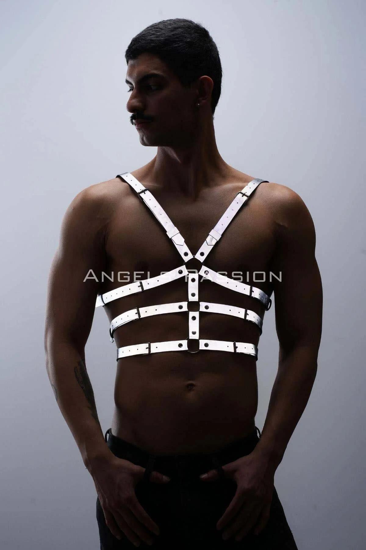 close-up gunmetal O-ring detail on white PU chest harness with roller buckle hardware