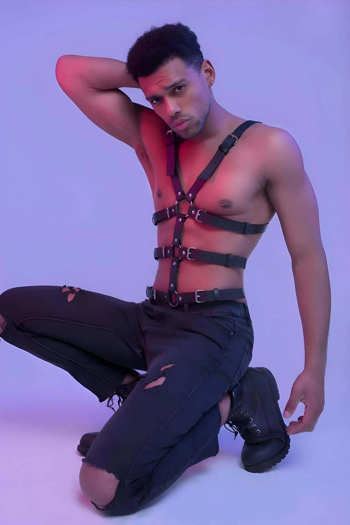 Adjustable black PU leather torso harness showing four horizontal bands with silver buckles at chest