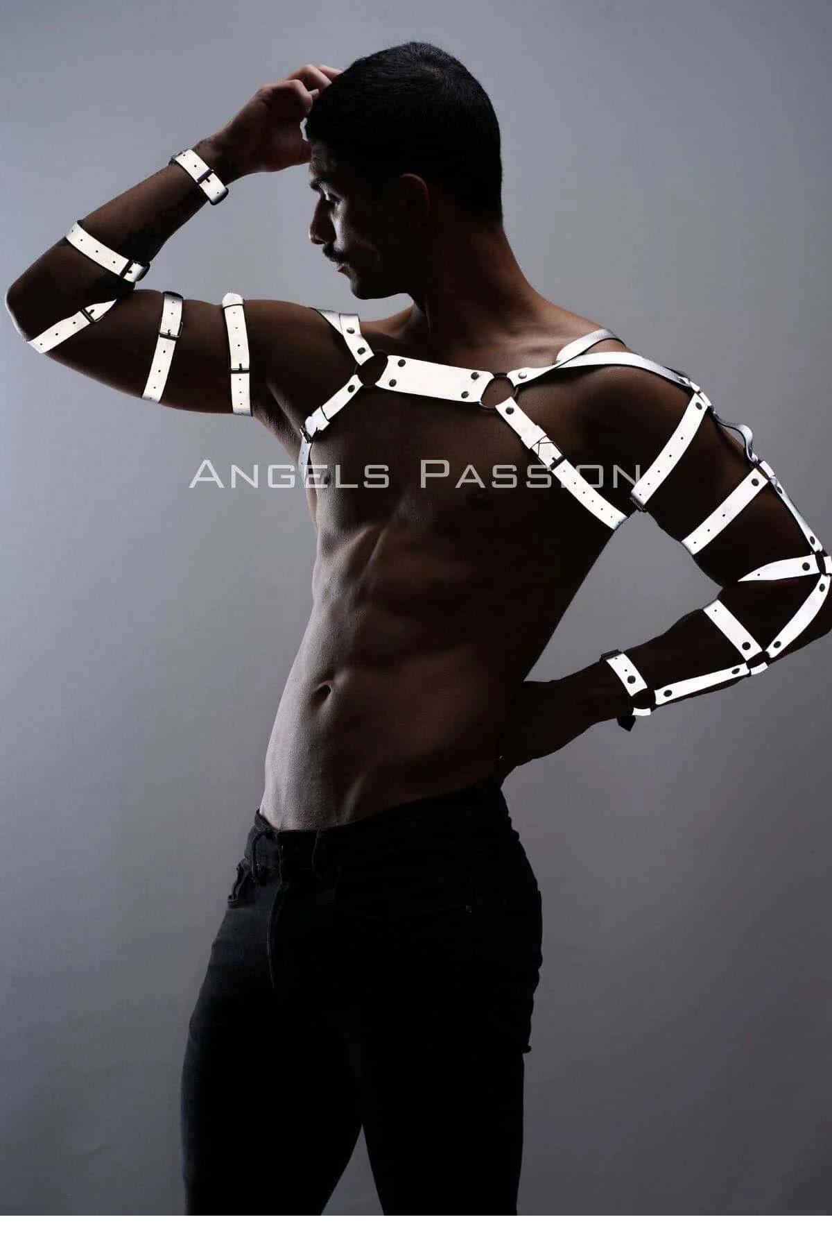 Side angle of white reflective arm cage harness showing horizontal bands from shoulder to wrist