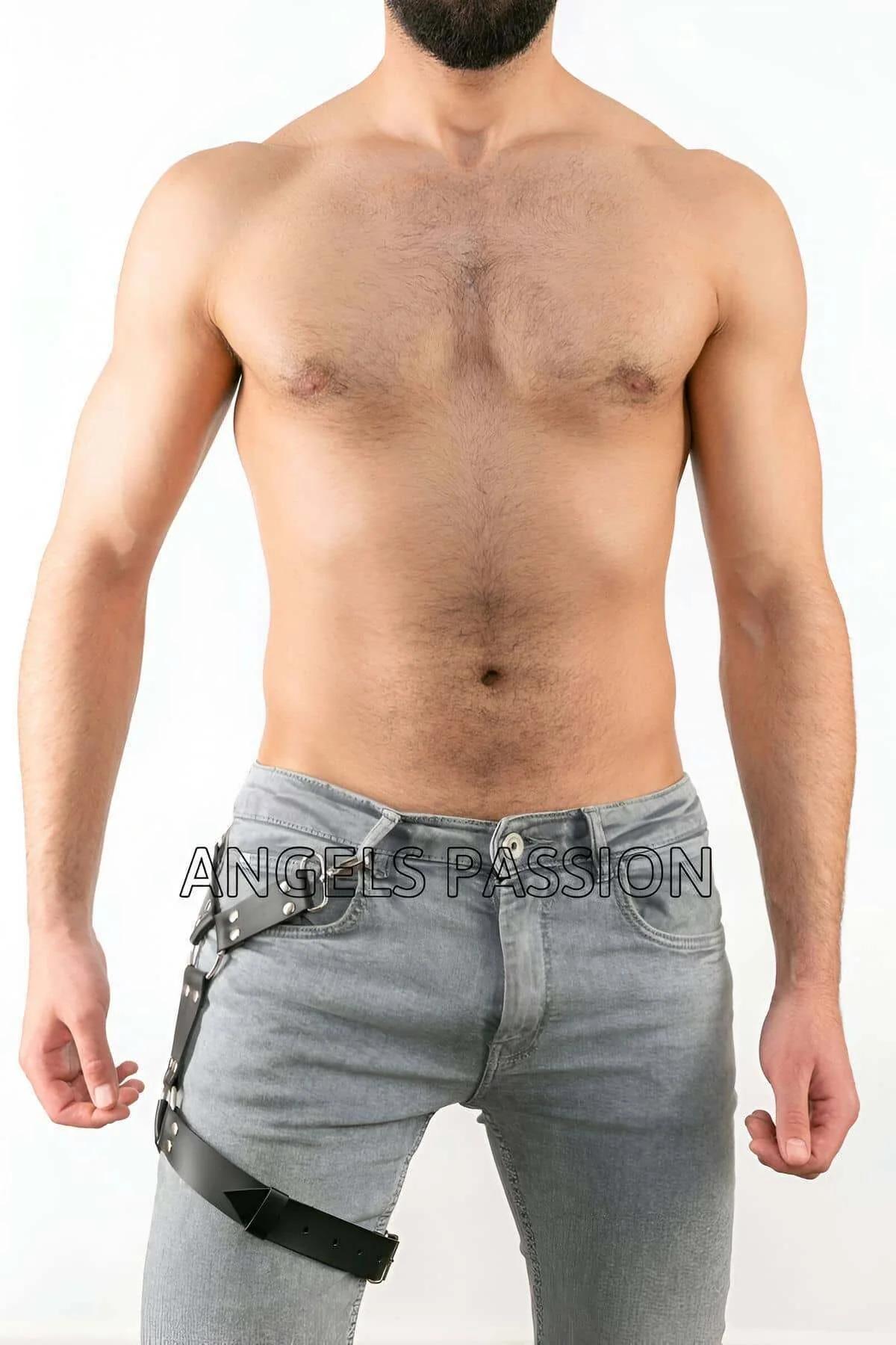 black faux leather leg harness showing adjustable buckle closure on hip strap, silver hardware detail