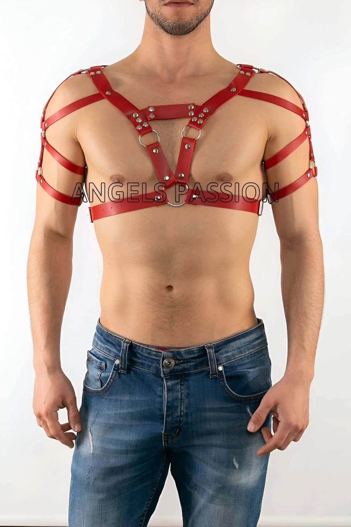 close-up of silver O-rings and red faux leather strap junctions on chest harness