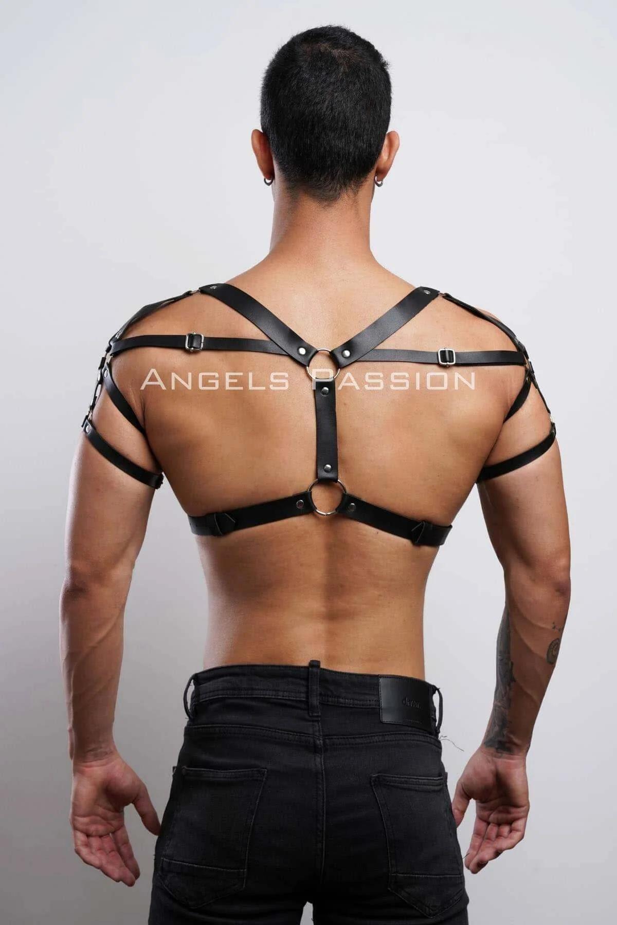Adjustable shoulder buckle detail on black V-strap men's body harness with silver zinc alloy hardware