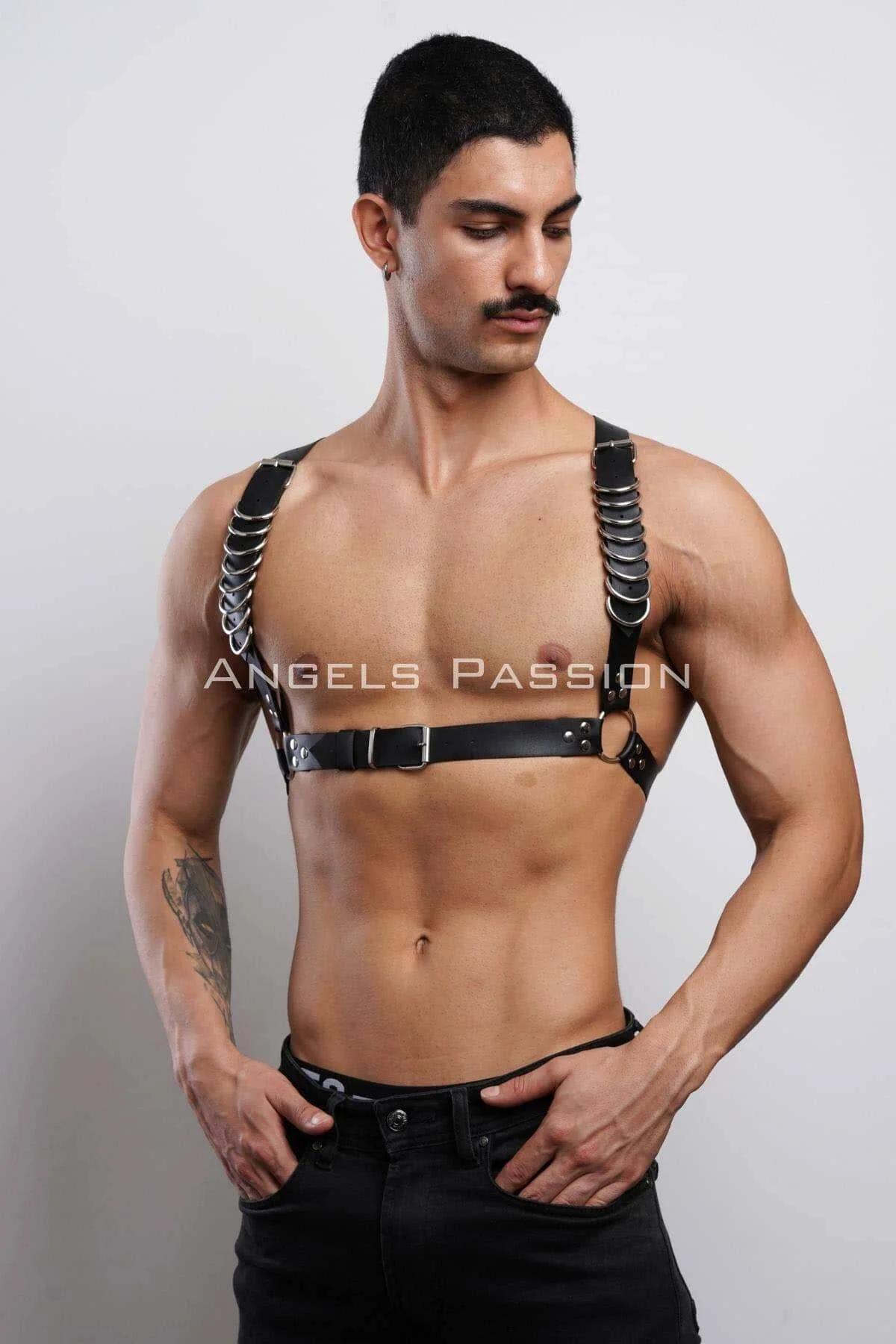 Black vegan leather chest harness with silver hardware flat lay product shot