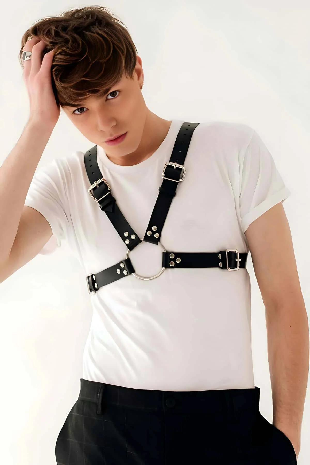 black chest harness adjustable roller buckles at shoulders and waist band