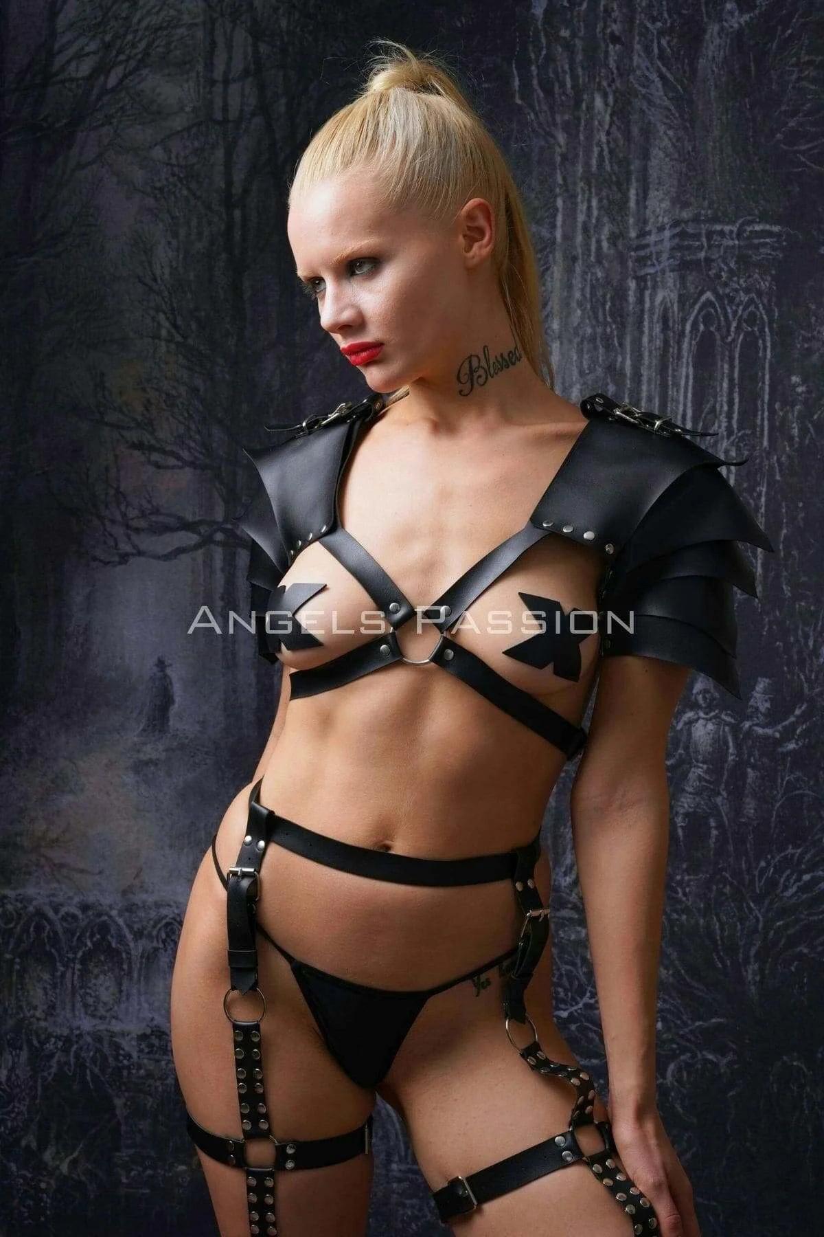 Black faux leather gladiator shoulder pad harness set with chest O-ring straps and adjustable thigh garters