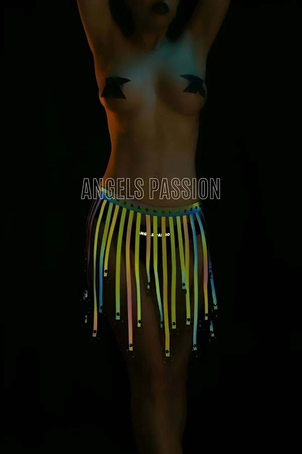 Reflective tassel harness skirt multi-color glow effect with neon green yellow pink blue strips and silver O-ring hardware on