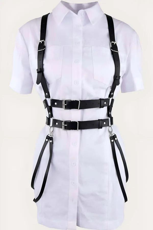 Black vegan leather adjustable body harness with dual silver rectangular buckles, shoulder straps, O-ring side details, and d
