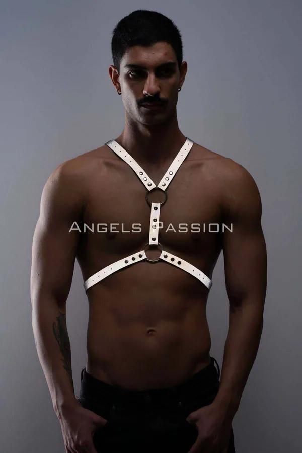 White reflective faux leather chest harness with dual stacked silver O-rings and eyelet rivet detailing, worn by male model