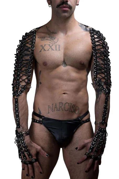 Black faux leather lace-up arm harness with O-rings covering shoulder to wrist on male model