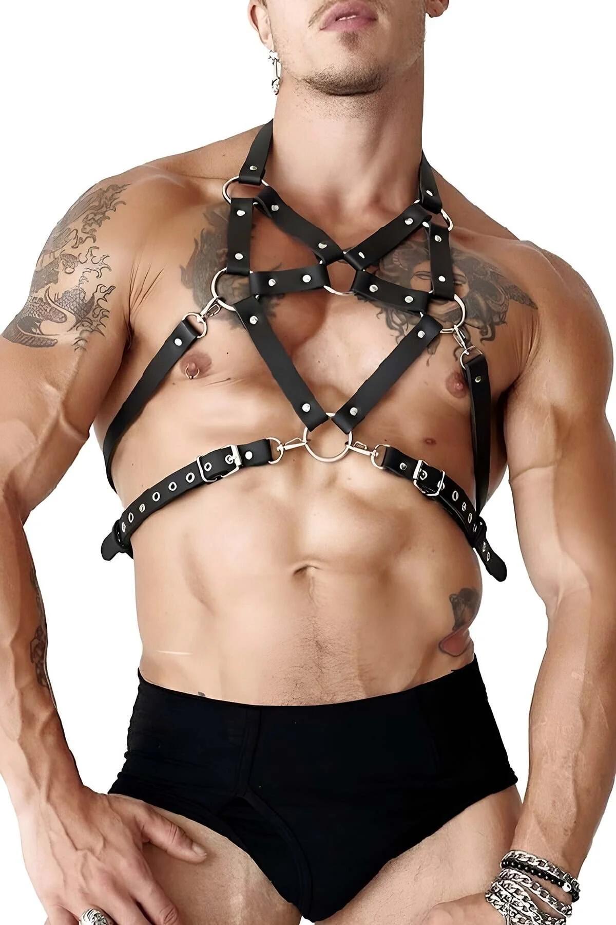Black faux leather pentagram chest harness with silver O-rings and adjustable grommet waist band worn by male model