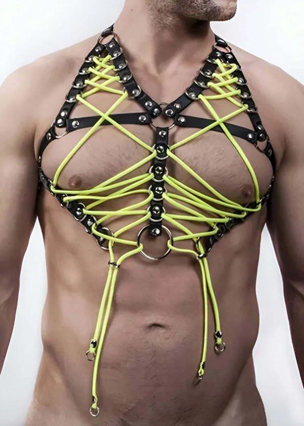 black faux leather caged chest harness with neon green rope lacing silver studs and O-ring center on male torso