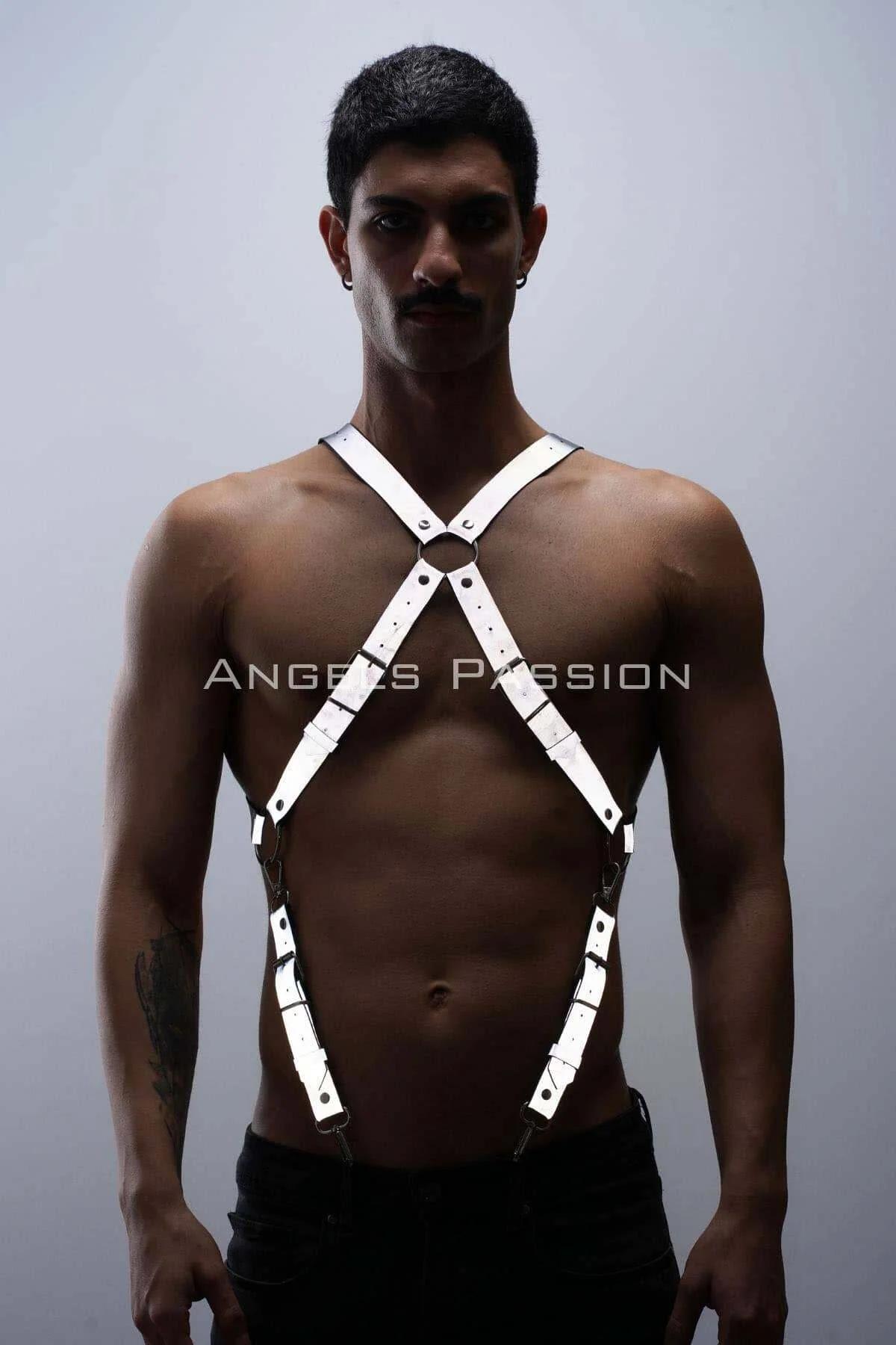 white reflective X-cross chest harness with silver O-ring center detail worn by male model